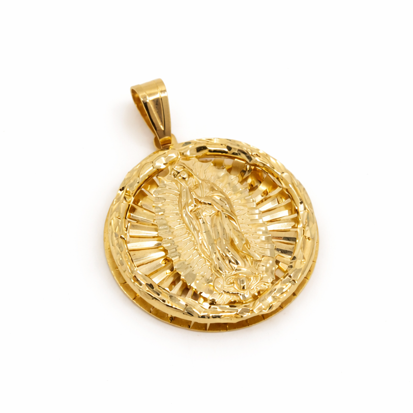 Gold pendant with a religious design on a white background