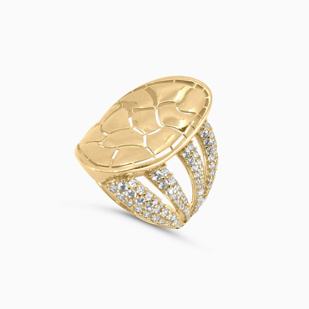 Gold ring with diamond accents on a white background