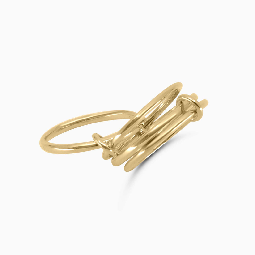 Gold ring with a diamond on a white background