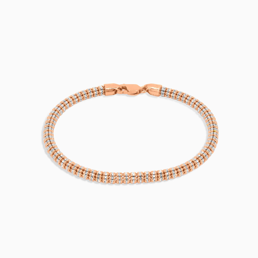 Rose gold bracelet on a white background