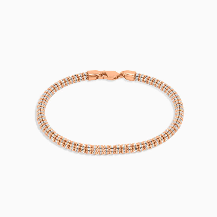 Rose gold bracelet on a white background