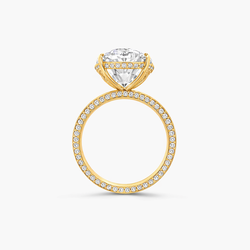 Gold ring with a diamond on a white background