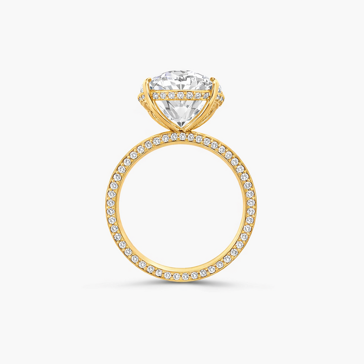 Gold ring with a diamond on a white background