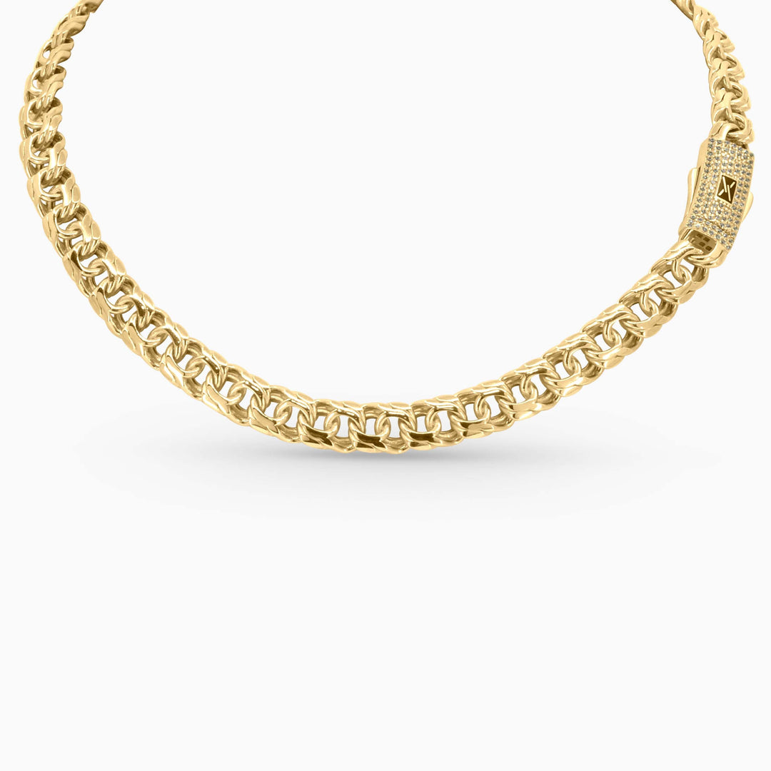 Gold chain necklace on a white background