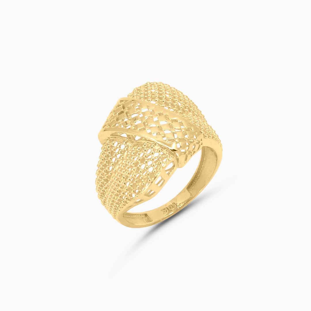 Gold ring with textured design on a white background