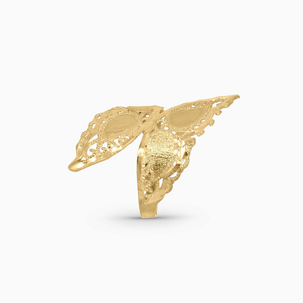Gold angel wing pendant on a white background