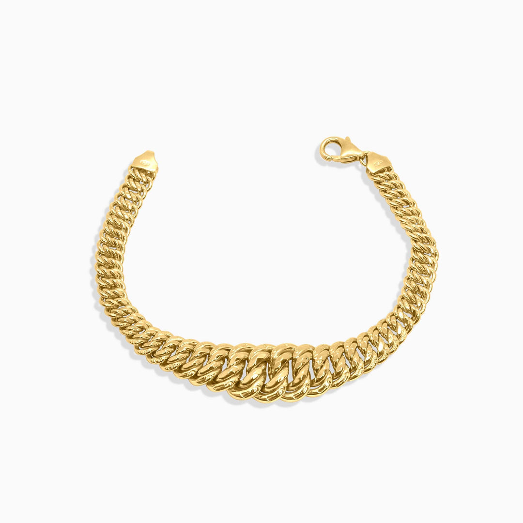 Gold chain necklace on a white background