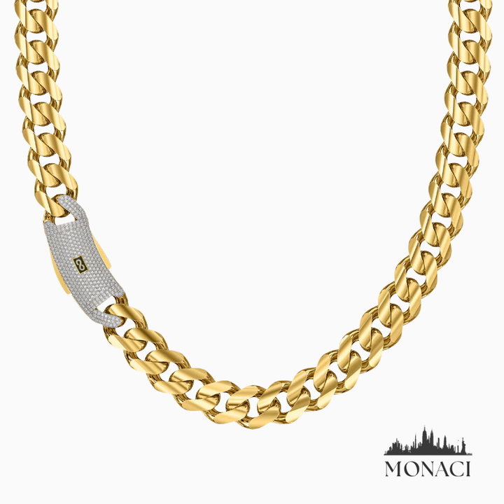 Gold chain necklace with a clasp on a white background, featuring the Monaci brand.