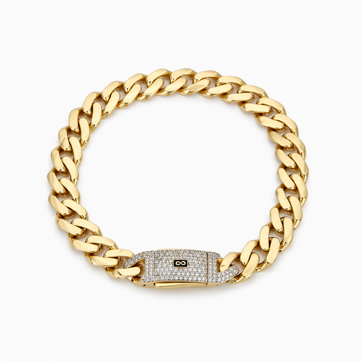 Gold chain bracelet with a clasp on a white background