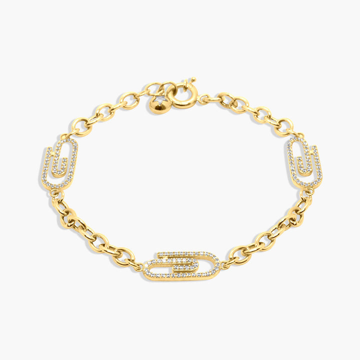 Gold bracelet with diamond accents on a white background