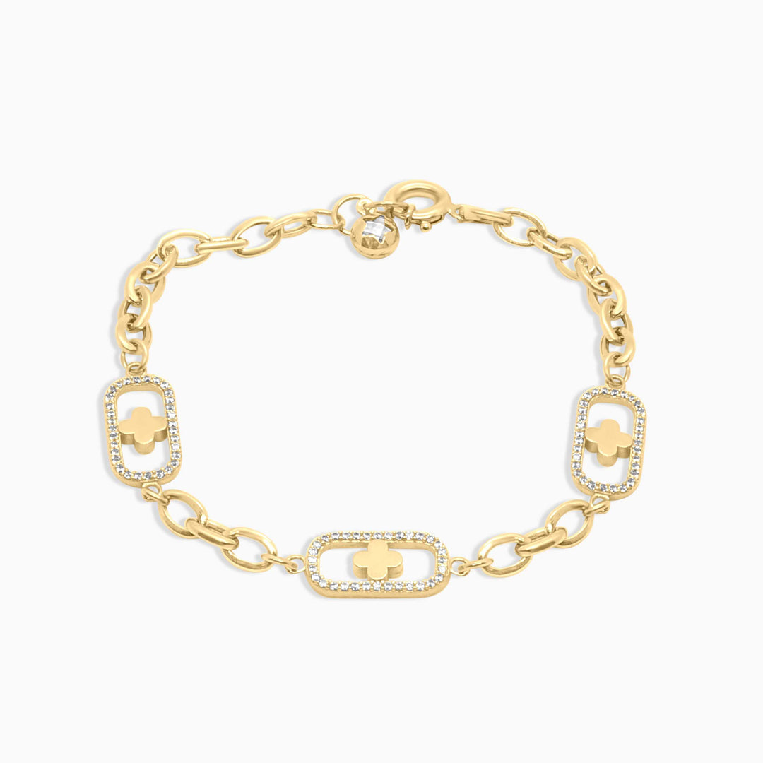 Gold bracelet with clover-shaped charms on a white background