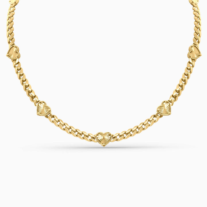 Gold chain necklace on a white background