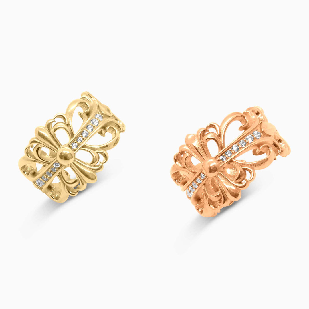 Pair of gold butterfly-shaped earrings on a white background
