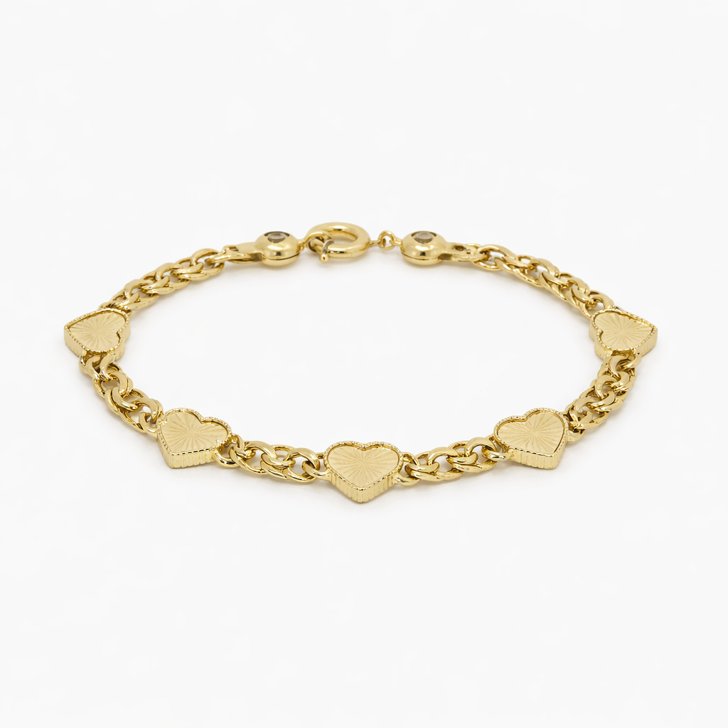 Gold bracelet with heart-shaped links on a white background