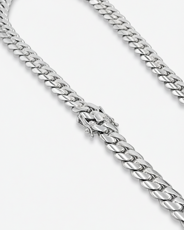 Silver chain necklace on a white background