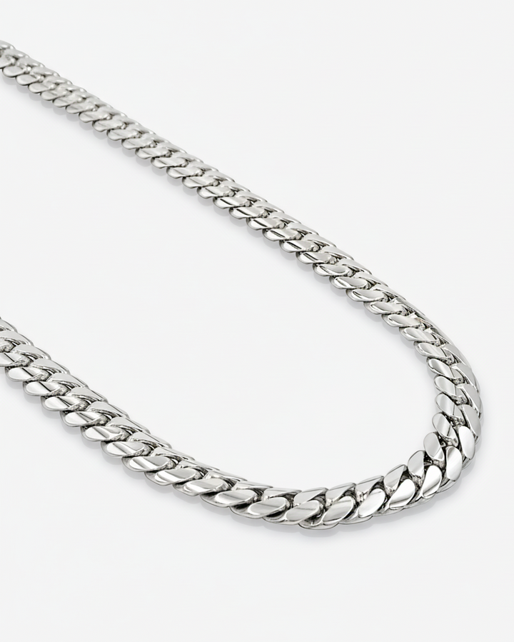 Silver chain necklace on a white background