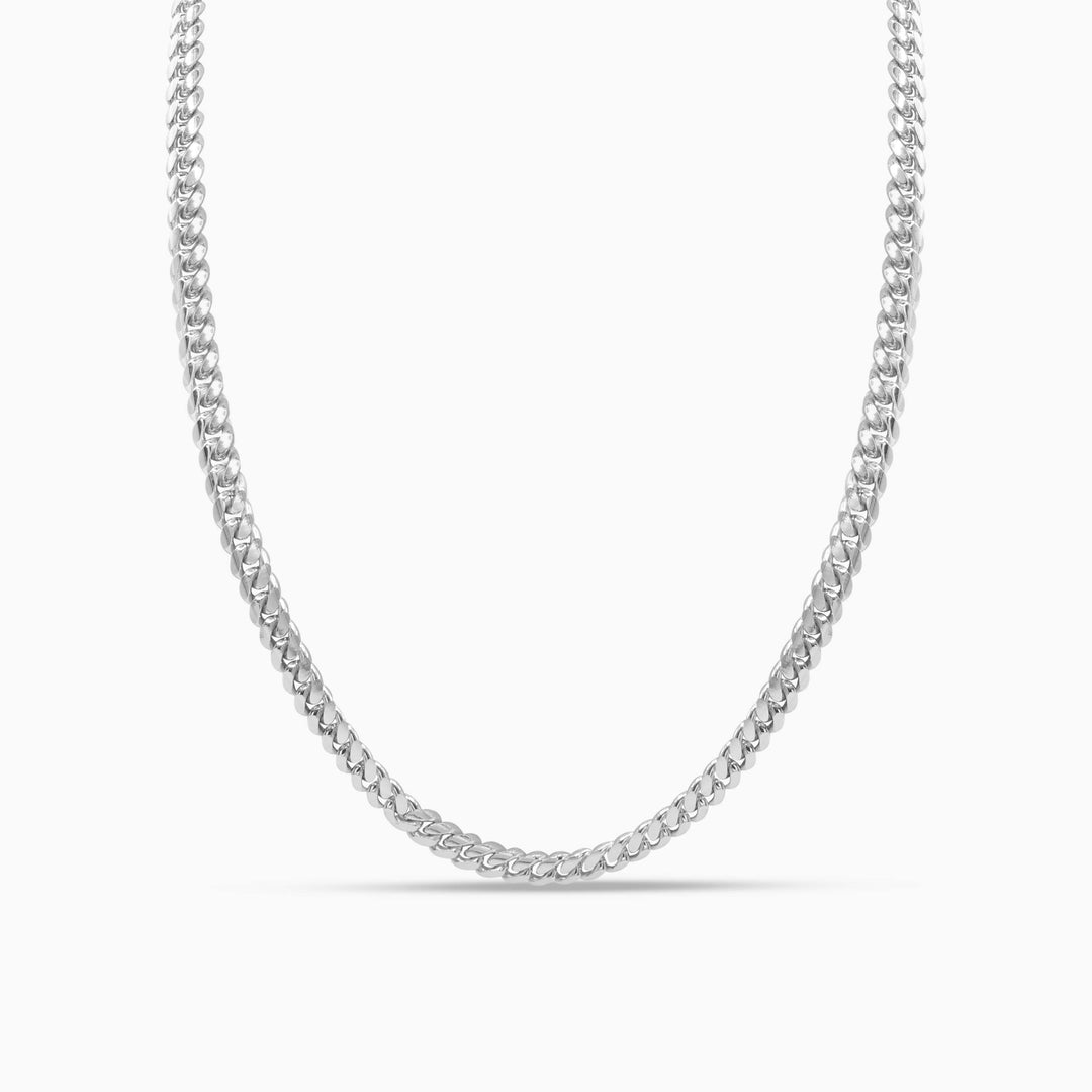 Silver chain necklace on a white background