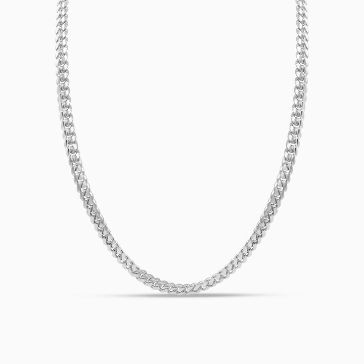 Silver chain necklace on a white background