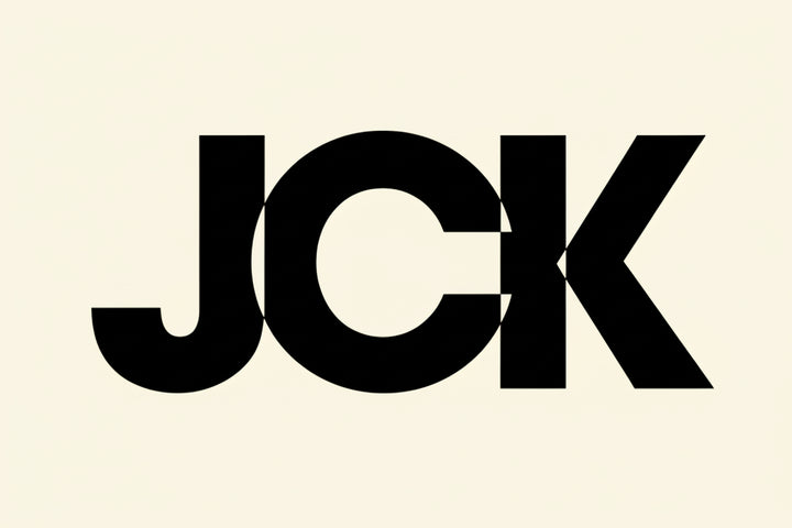 Black 'JCK' logo on a white background