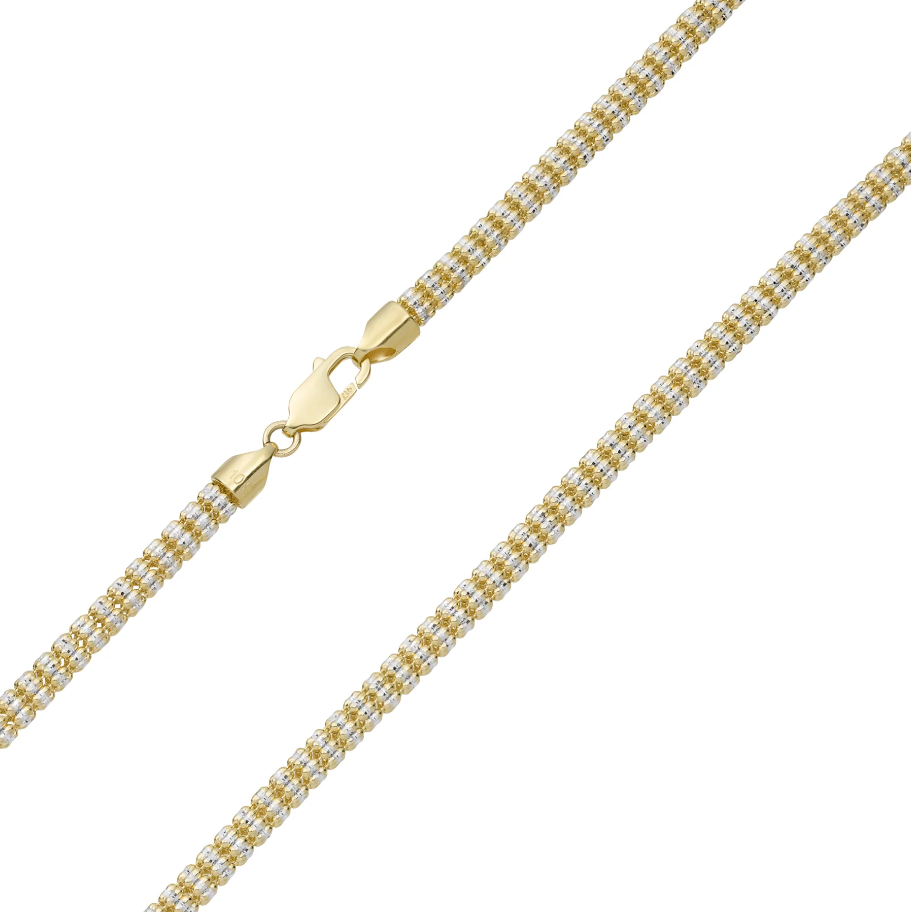 Gold chain necklace on a white background