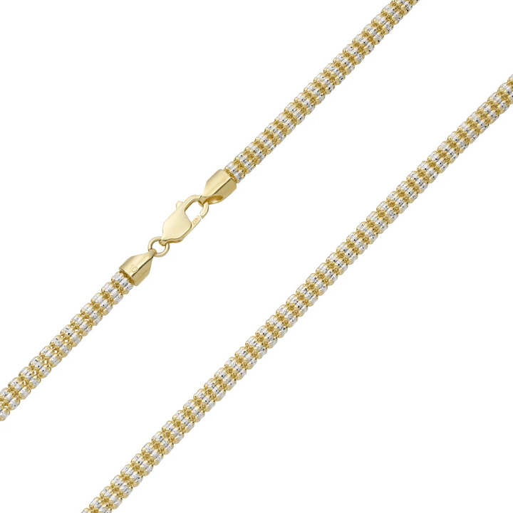 Gold chain necklace on a white background